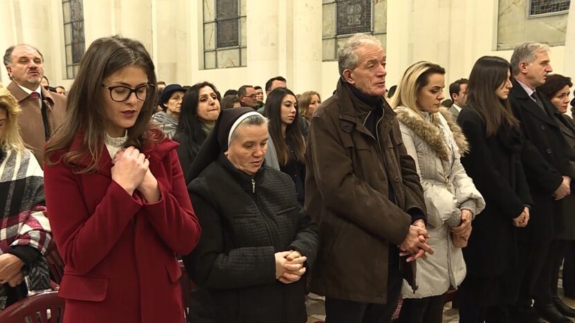 Members of the Christian Minority in Kosovo Praying. Concept for Religious Tolerance.